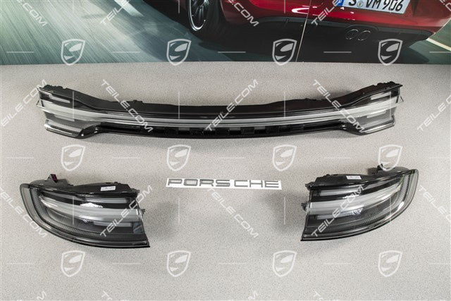 LED rear lights, black, set: left+right+center, with „PORSCHE" inscription/logo silver