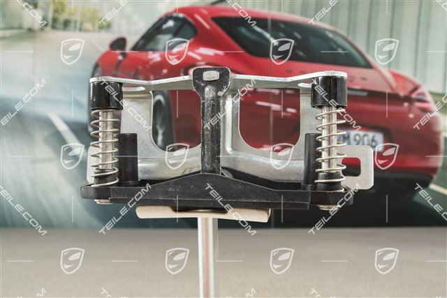 Rear lid striker