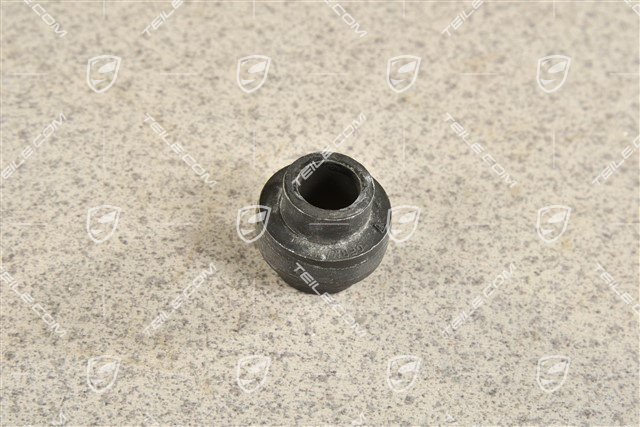 Tensioning element for headlight mounting