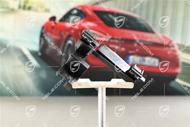 Mounting for rear view camera connection plug