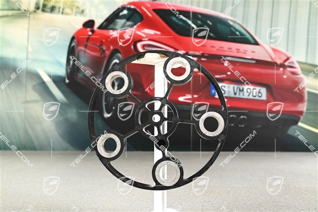 Spacer, spare wheel holder on the tailgate